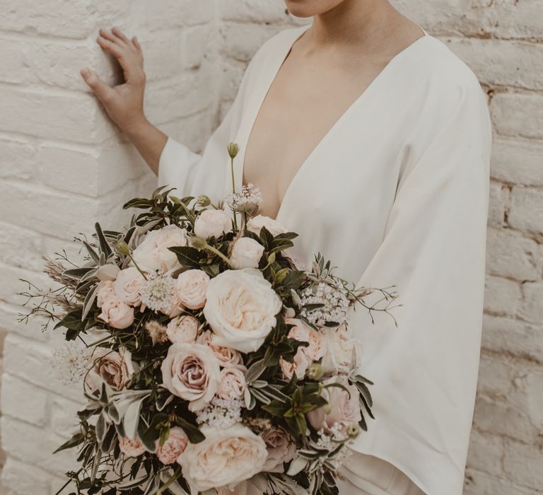 Beautiful Bride in Wrap Wedding Dress &amp; Vine Headpiece | Romantic Pink and Gold Wedding Inspiration in a Modern Summer House at Garthmyl Hall by KnockKnockPenny Studio | Nesta Lloyd Photography