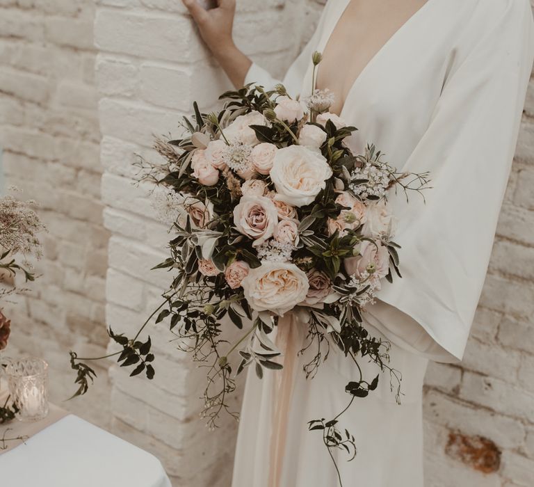 Baby Pink Rose Wedding Bouquet | Beautiful Bride in Wrap Wedding Dress &amp; Vine Headpiece | Romantic Pink and Gold Wedding Inspiration in a Modern Summer House at Garthmyl Hall by KnockKnockPenny Studio | Nesta Lloyd Photography