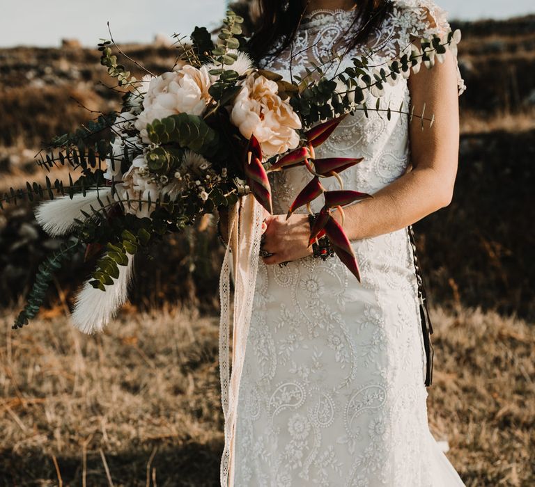 Oversized Peach &amp; Foliage Bridal Bouquet | Boho Bride in Napolitano Trotta Maison Embellished Wedding Dress | A Wild Bohemian Bride in the Majella National Park, Abruzzo, Italy | Planned &amp; Styled by Antonia Luzi | Federico Lanuto Photography