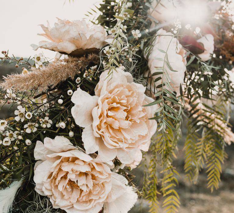 Peach Wedding Flowers | A Wild Bohemian Bride in the Majella National Park, Abruzzo, Italy | Planned &amp; Styled by Antonia Luzi | Federico Lanuto Photography