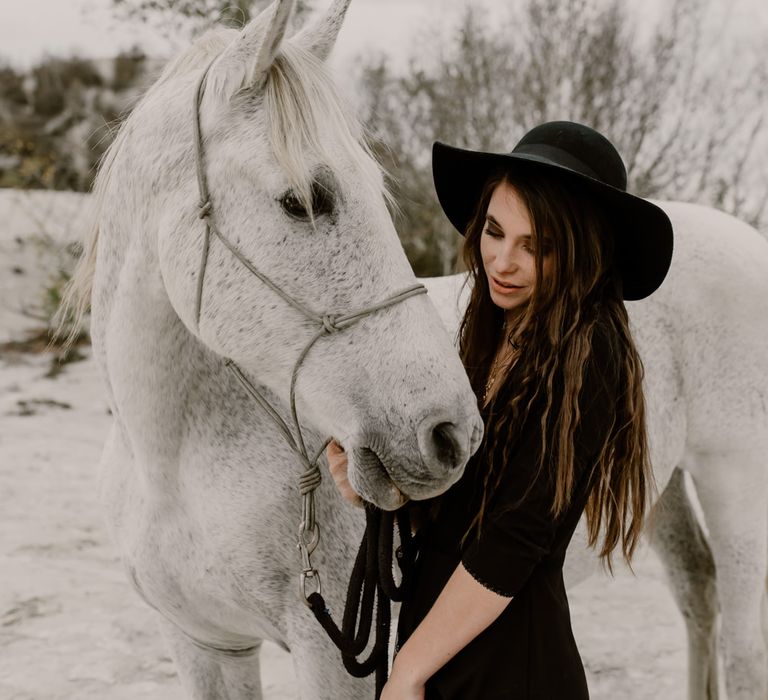 White Horse | Bride in Portez Vos Idées Black Wedding Dress | Wild Same Sex Couple Wedding Inspiration Shoot | Anne Letournel Photography