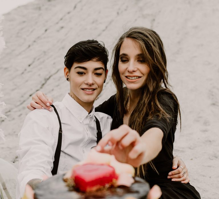 Bride in Portez Vos Idées Black Wedding Dress | Bride in Black Trousers, White Shirt &amp; Braces | Wild Same Sex Couple Wedding Inspiration Shoot | Anne Letournel Photography