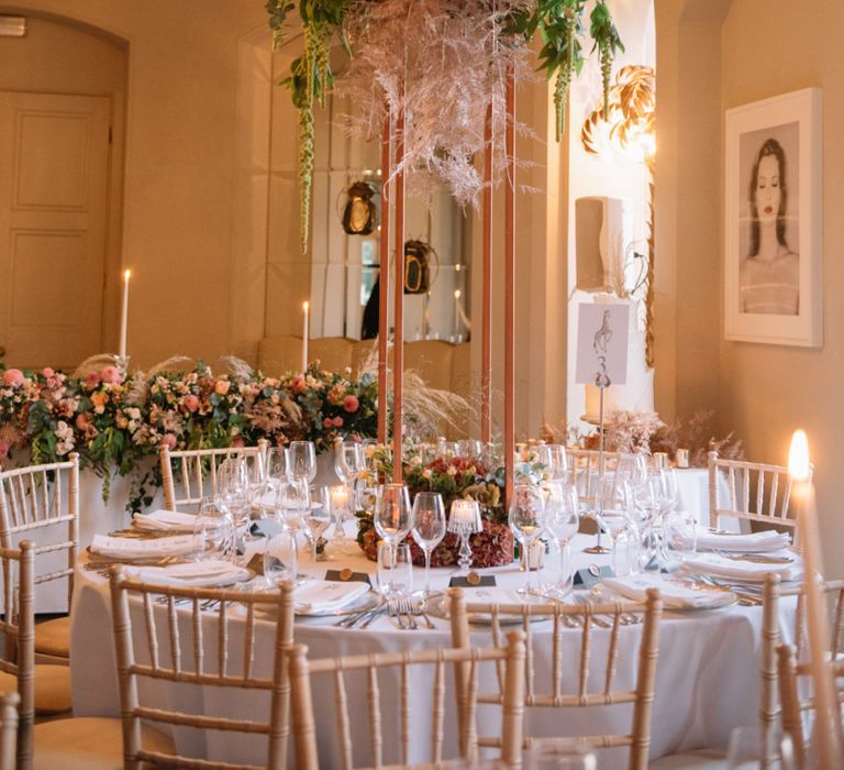 Tall flower centrepiece on copper stand