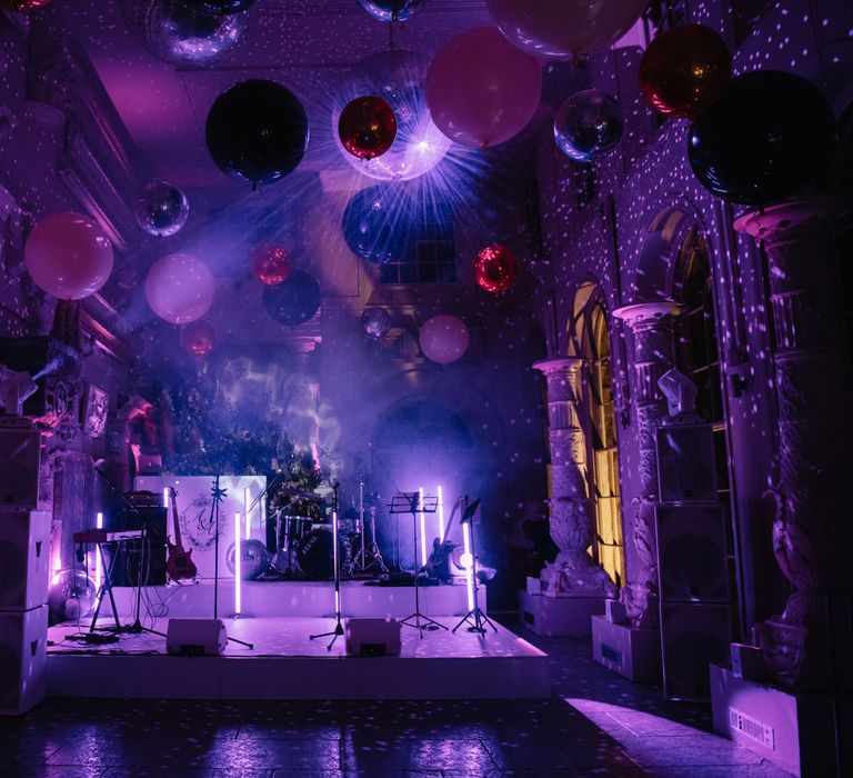 Evening reception at Aynhoe Park with Giant balloons, smoke machine and disco balls