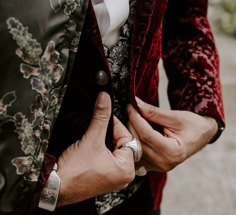 Stylish groom patterned waistcoat and pink blazer