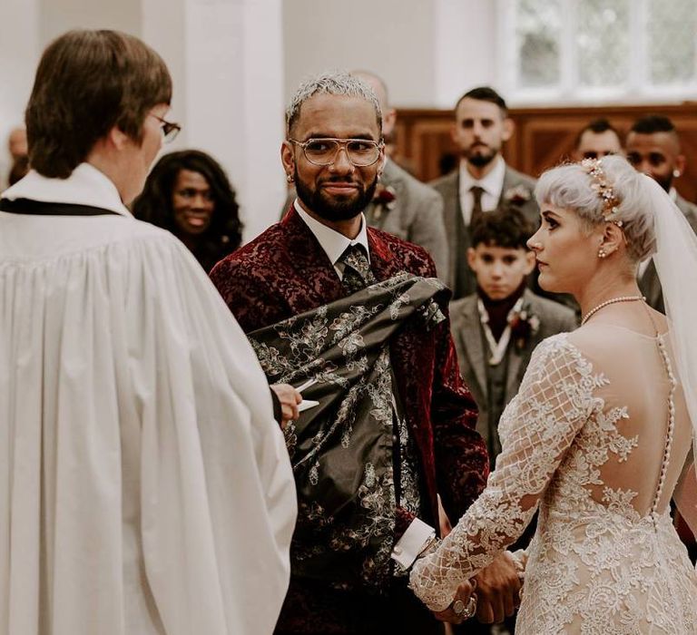 Bride and groom exchanging vows at church wedding ceremony