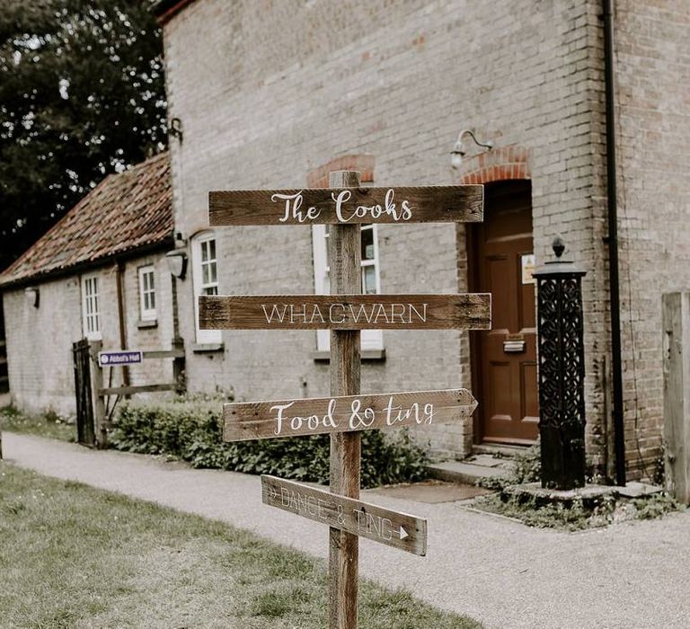 wedding direction sign post