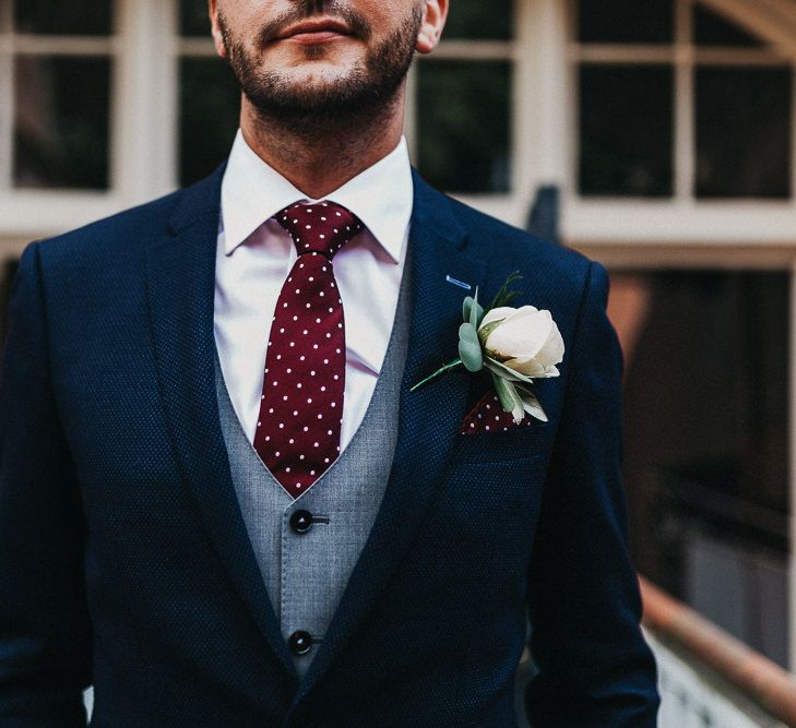 Wedding Morning Preparations | Groom in Navy Suit from Coneys of Lincoln | Burgundy Polka Dot Tie | Nottinghamshire Wedding with Spanish Vibes and Rewritten Bridesmaids Dresses | Kev Elkins Photography