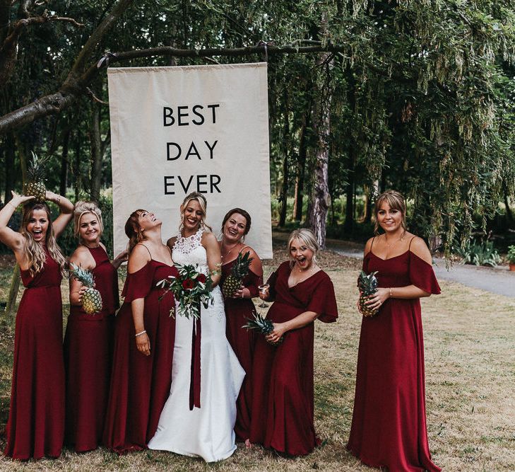 Bride in Lace Racerback Essence of Australia Wedding Dress | Bridesmaids in Mismatched Burgundy Rewritten Dresses | Nottinghamshire Wedding with Spanish Vibes and Rewritten Bridesmaids Dresses | Kev Elkins Photography