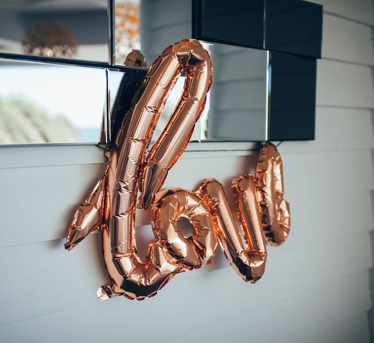 Copper Love Balloons | Wedding Reception Décor | Gypsophila Arch and Giant Balloons for an Outdoor Coastal Wedding | Toby Lowe Photography