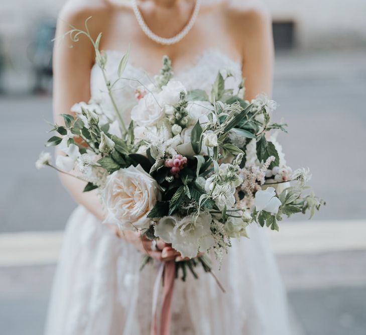 White flower bouquet with ribbon detailing for intimate Oxford wedding