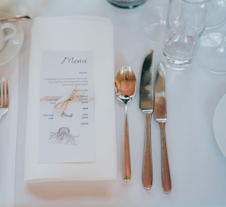 Classic table decor with place setting tied with a bow for intimate reception at Bodleian library