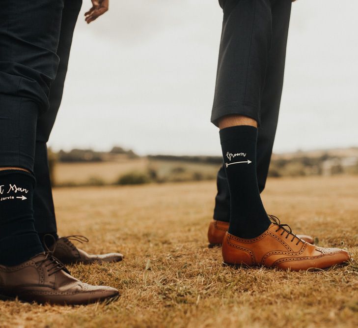 Groom in personalised socks and brown brogues