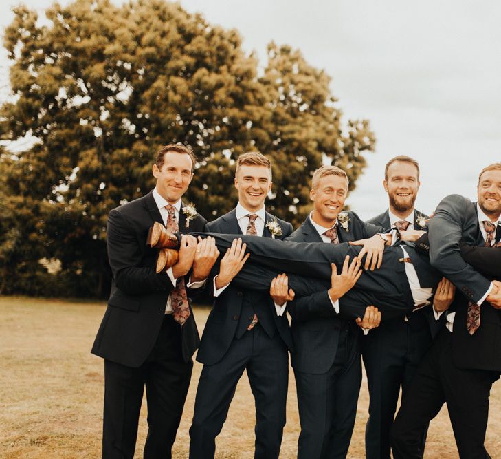 Groom and groomsmen with patterned ties