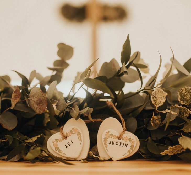 Foliage table runner with personalised heart decor