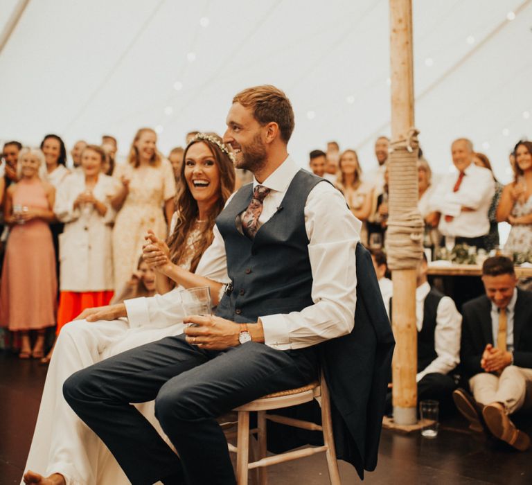 Bride and groom enjoy incredible wedding speeches