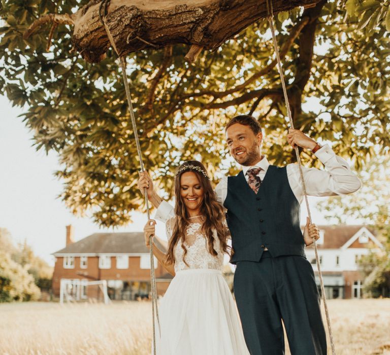 Bride and groom at family home for marquee wedding