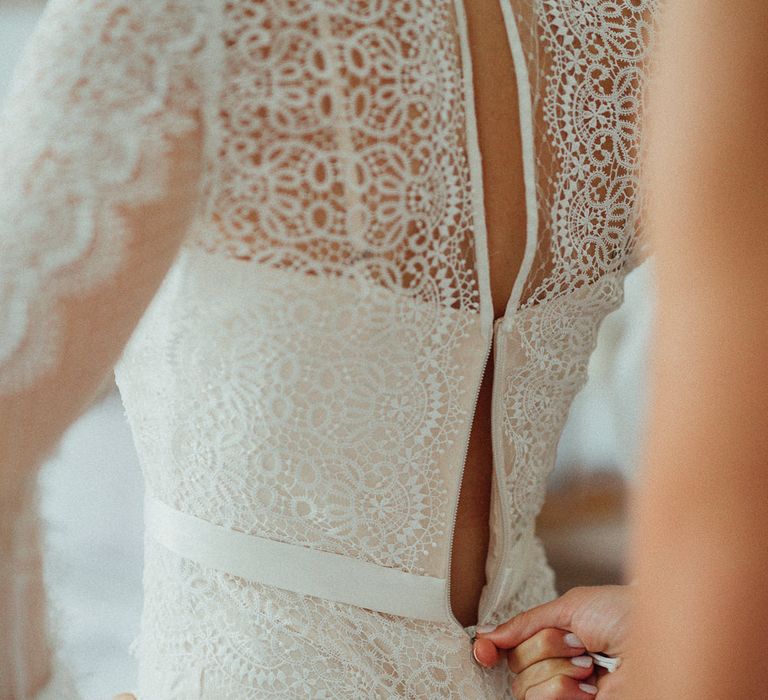 Bridal Morning Preparations | Bride in Laced Catherine Deane Wedding Dress with Long Sleeves | Loose Fishtail Plait with Gypsophilia | Homemade Hair Comb | Rustic French Destination Wedding with Homegrown Flowers  | Emily &amp; Steve Photography