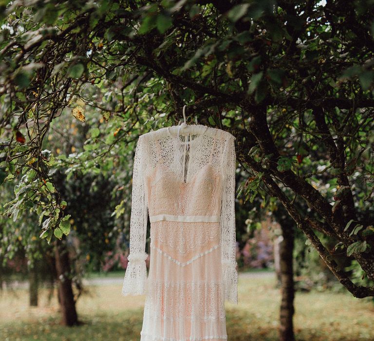 Laced Catherine Deane Wedding Dress with Long Sleeves | Rustic French Destination Wedding with Homegrown Flowers | Emily &amp; Steve Photography