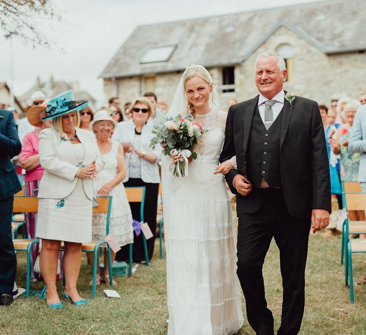 Wedding Ceremony | Bride in Laced Catherine Deane Wedding Dress with Long Sleeves | Rustic French Destination Wedding with Homegrown Flowers  | Emily &amp; Steve Photography