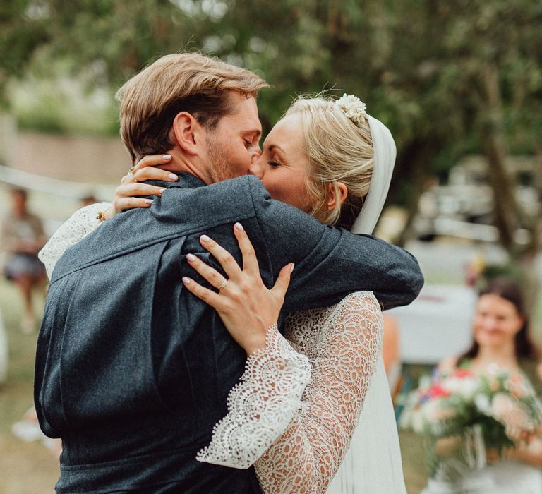 Wedding Ceremony | Bride in Laced Catherine Deane Wedding Dress with Long Sleeves | Groom in Blue Thomas Farthing Suit with Ochre Tie | Rustic French Destination Wedding with Homegrown Flowers  | Emily &amp; Steve Photography