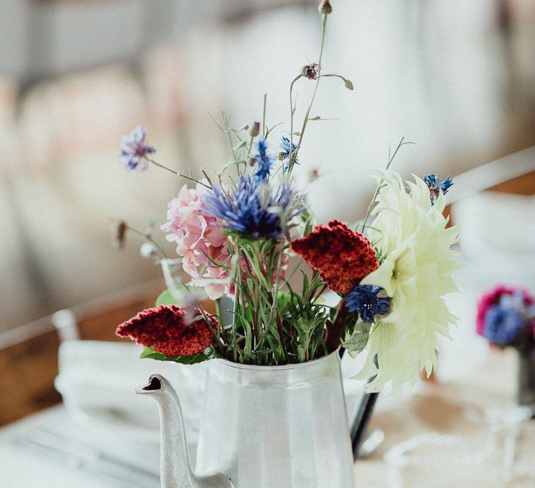 Wedding Reception Decor | Bright Flowers in Silver Tea Pot | Hessian Runner | Rustic French Destination Wedding with Homegrown Flowers  | Emily &amp; Steve Photography