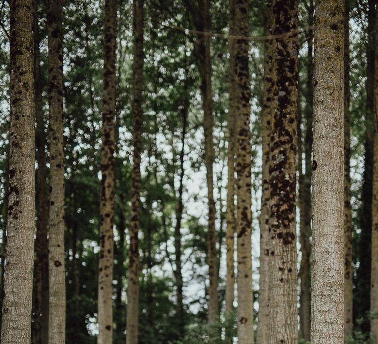 Bride in Laced Catherine Deane Wedding Dress with Long Sleeves | Groom in Blue Thomas Farthing Suit with Ochre Tie | Rustic French Destination Wedding with Homegrown Flowers  | Emily &amp; Steve Photography