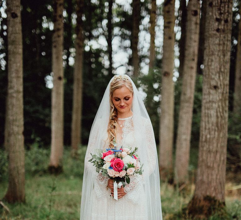 Bride in Laced Catherine Deane Wedding Dress with Long Sleeves | Loose Fishtail Plait with Gypsophilia | Homemade Hair Comb | Rustic French Destination Wedding with Homegrown Flowers  | Emily &amp; Steve Photography