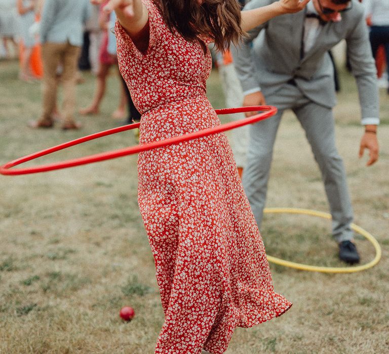 Garden Party Reception | Wedding Guest Doing Hula Hoop | Rustic French Destination Wedding with Homegrown Flowers  | Emily &amp; Steve Photography