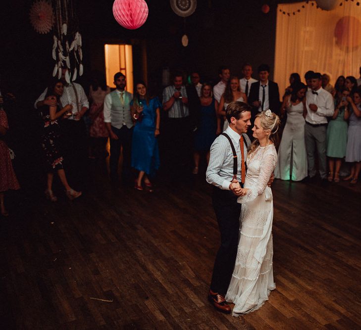 First Dance | Bride in Laced Catherine Deane Wedding Dress with Long Sleeves | Groom in Blue Thomas Farthing Suit with Ochre Tie | Rustic French Destination Wedding with Homegrown Flowers  | Emily &amp; Steve Photography