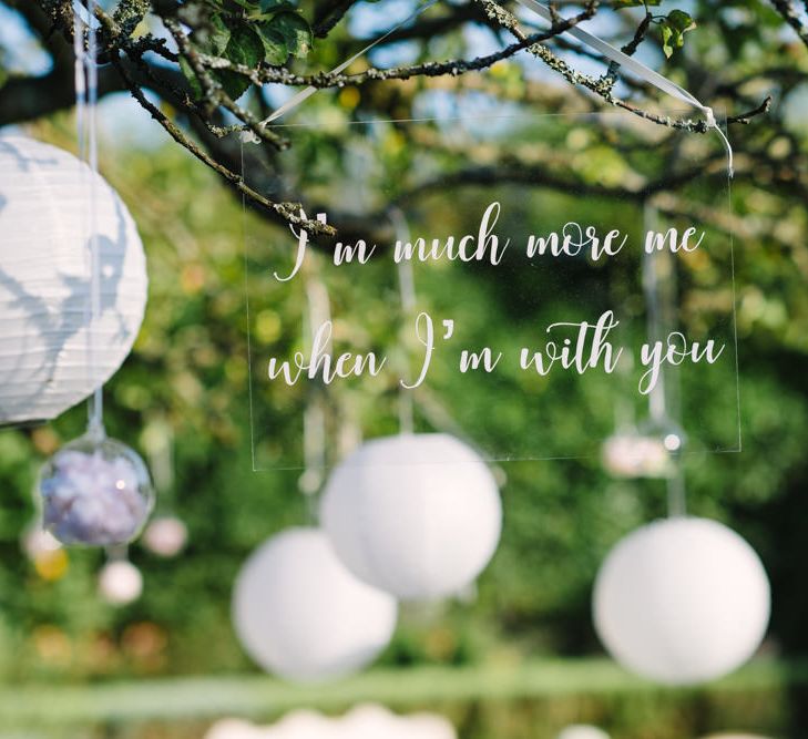 White Calligraphy Perspex Hanging Quote Wedding Sign | Classic Pink &amp; White Wedding at Northbrook Park, Surrey | Tell Your Story Photography | Yours Truly Wedding Films