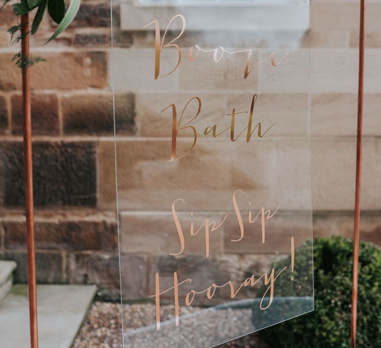 Calligraphy Acrylic Wedding Sign  on Copper Frame | Pink Roll Top Booze Bath and Copper &amp; Perspex Wedding Decor at Industrial Venue The West Mill | Rosie Kelly Photography