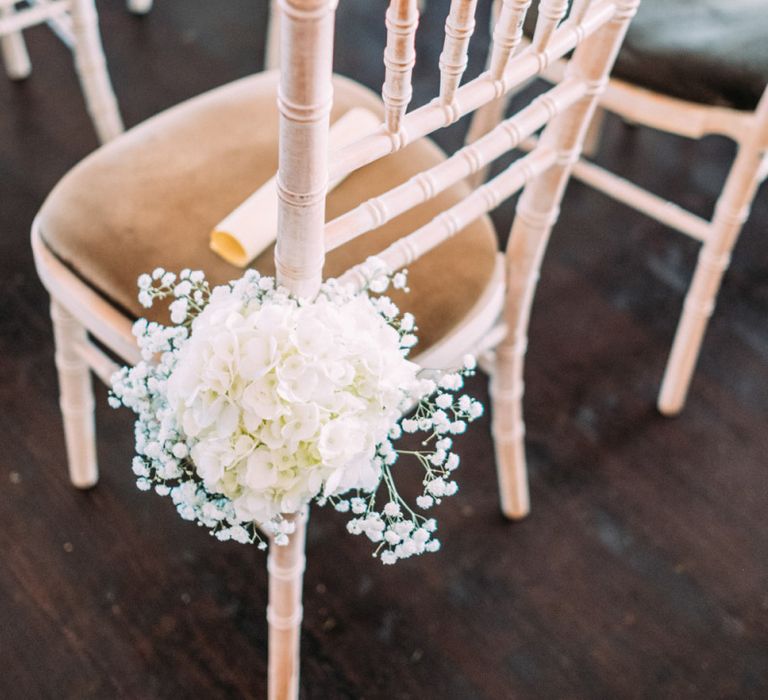 White Hydrangea and Gypsophila Chair Back Wedding Flowers