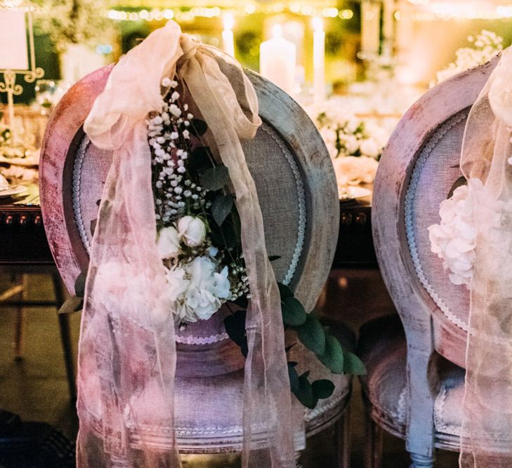 Chairs with Ribbon and Flower Decor