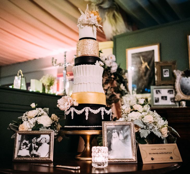 Art Decor Wedding Cake with Black &amp; White Family Portraits