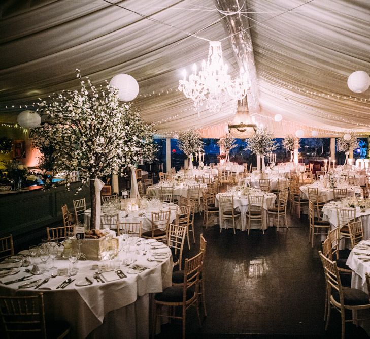 Wedding Reception Decor with Tree Centrepieces and Light Up Letters