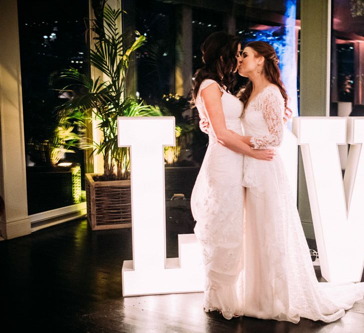 First Dance with Two Brides in Lace Wedding Dresses