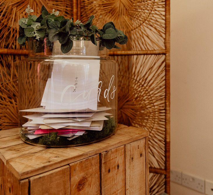 Cards jar decorated with foliage