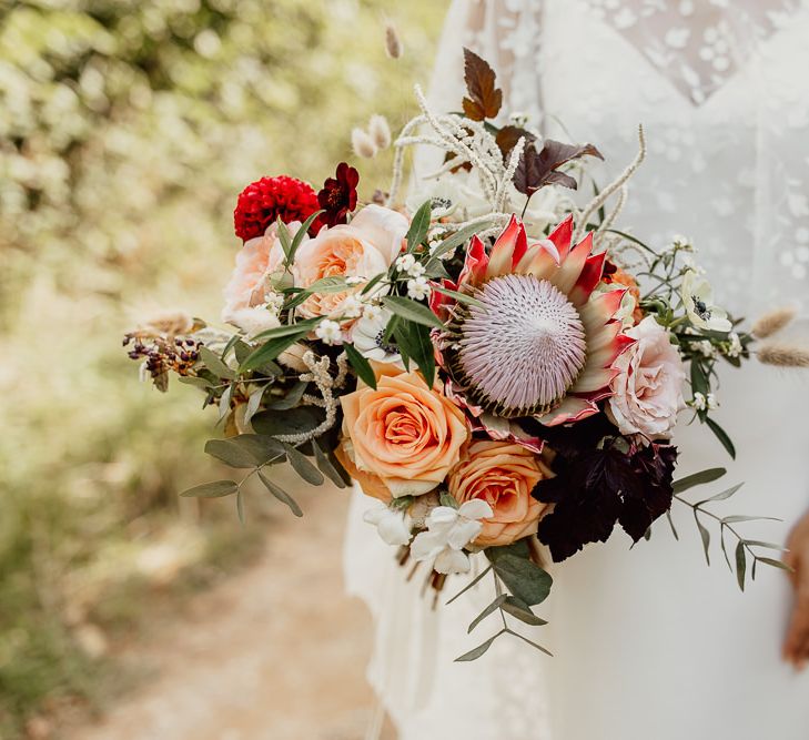 Beautiful coral and blush bridal bouquet