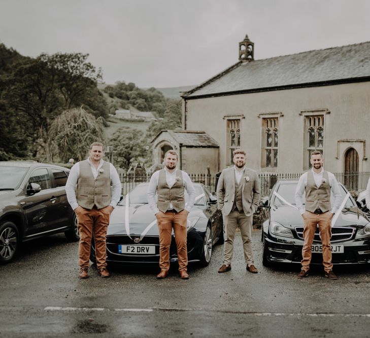 Groom and his groomsmen at Hobbit Hill wedding with church ceremony