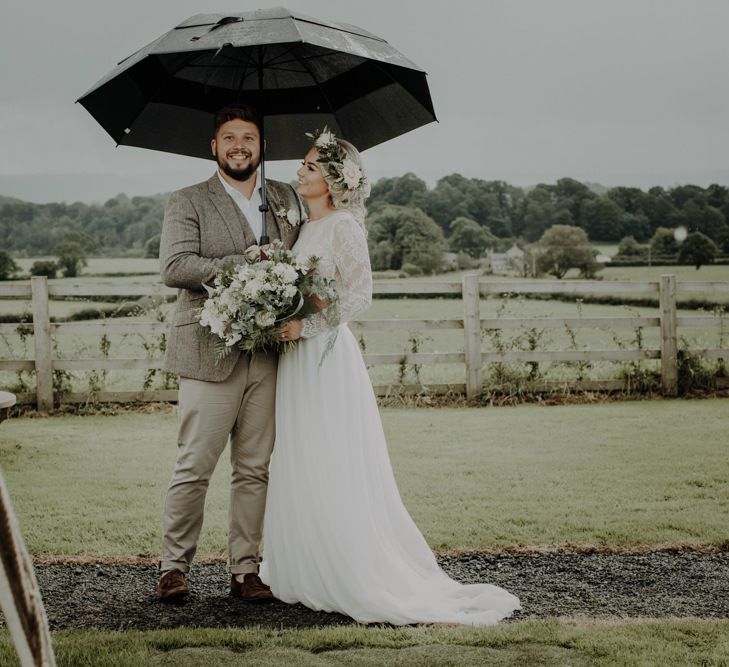 Bride and groom make the most of the English summer at Hobbit Hill