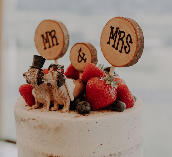 Rustic tree stump Mr &amp; Mrs wedding cake topper with dogs and berry decor