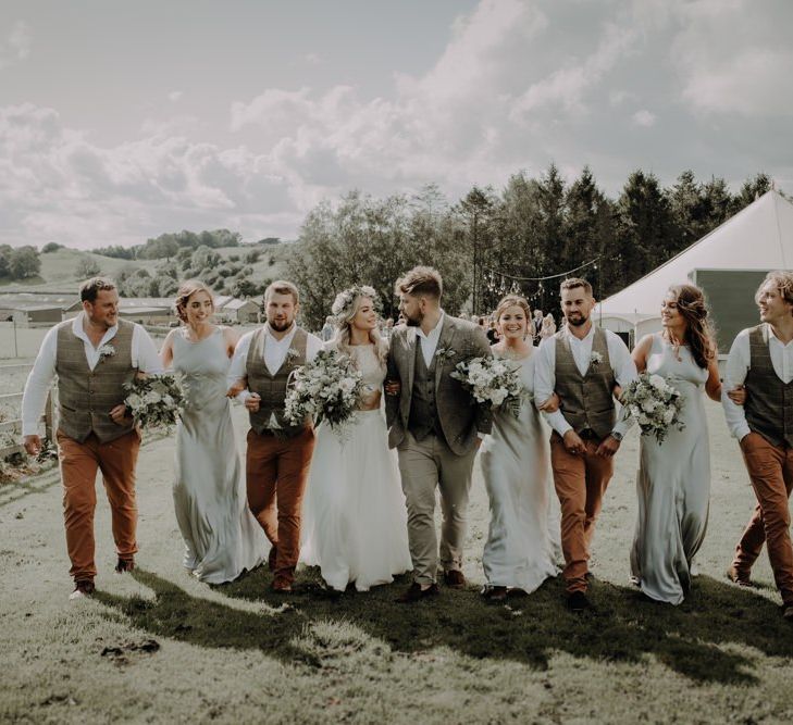 Bride and groom with their wedding party at Hobbit Hill for marquee reception