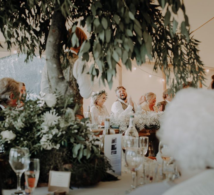 Speeches at marquee reception at Hobbit Hill with foliage styling