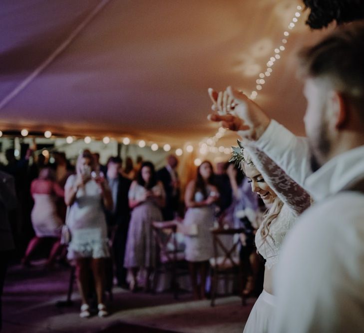 Couples first dance at Hobbit Hill with marquee reception