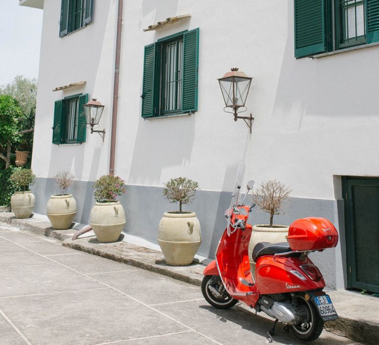 Orange Vespa Outside Italian Villa