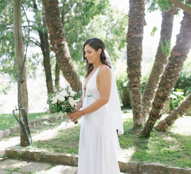 Minimalist Wedding Dress With White Wedding Flowers