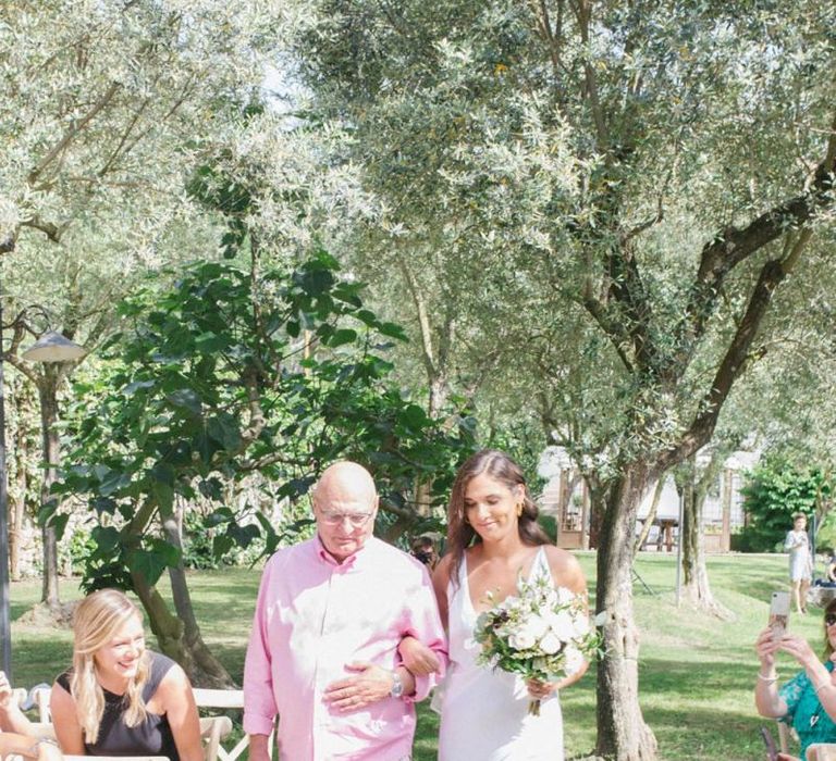 Bride Walks Down Aisle For Outdoor Ceremony For Lemon Wedding Decor Celebration