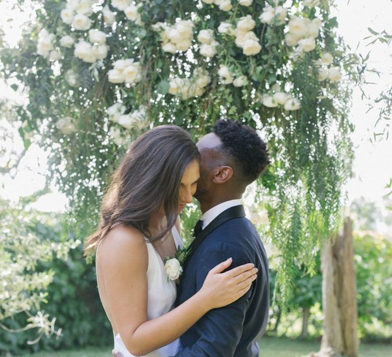 Bride and Groom Embrace After Ceremony In Italy