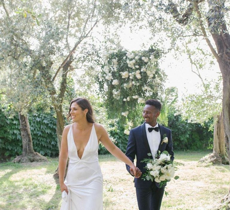 Bride and Groom Walk Through Italian Villa Gardens